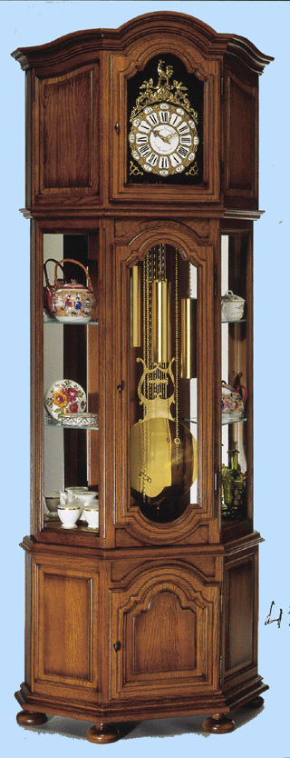 Rf : 452 CHNE 
MAESTRO
Horloge Vitrine Fond Plat 
Pieds-Boule
VITRINE LOUIS XIV 

Entirement massive sauf fonds de miroirs
Pieds-Boule
Equipe de 2 miroirs et de 6 tablettes glace 6mm
Livre avec clairage intrieur 
Fabrication artisanale

CornicheChapeau de Gendarme 
Porte Chapeau de Gendarme 
Ouverture de tte 39 x 24cm.
H: 2,20m / L: 0,84m / P: 0,36m
