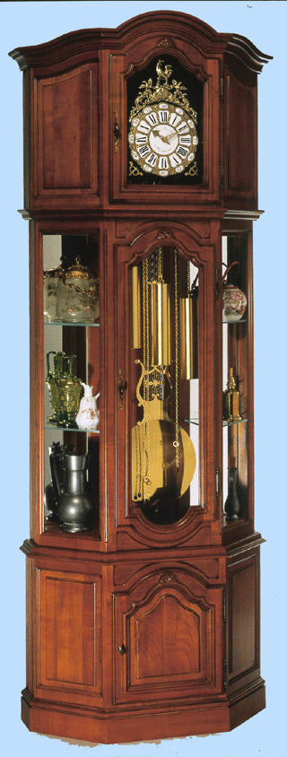 Rf : 460 Merisier 
Horloge Vitrine Fond Plat 
Socle Plinthe 
VITRINE LOUIS XV 

Entirement massive sauf fonds de miroirs
Socle Plinthes 
Equipe de 2 miroirs et de 6 tablettes glace 6mm
Livre avec clairage intrieur 
Fabrication artisanale

Corniche Chapeau de Gendarme 
Porte Chapeau de Gendarme 
Ouverture de tte 39 x 24cm.
H: 2,20m / L: 0,84m / P: 0,36m